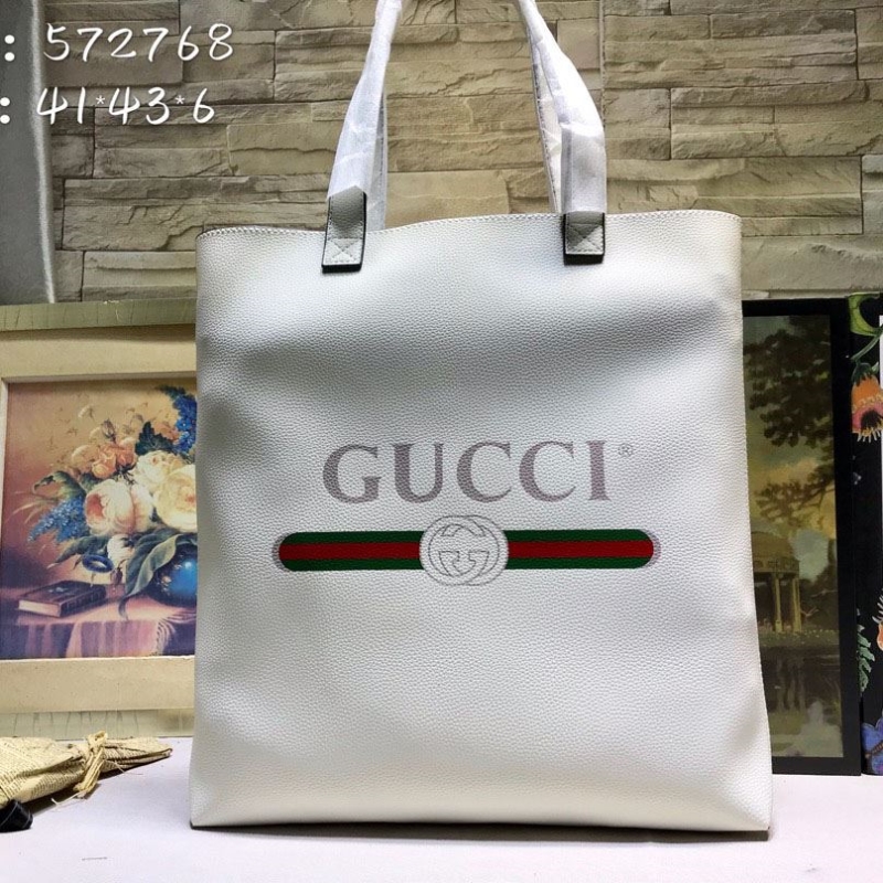 G*u*i shopping bags